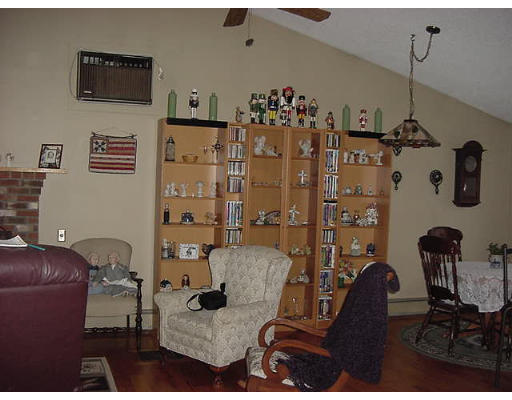 21 Simonds Hill Road Hubbardston, MA 01452 - Photo 8 of 8 a living room with furniture and wooden floor
