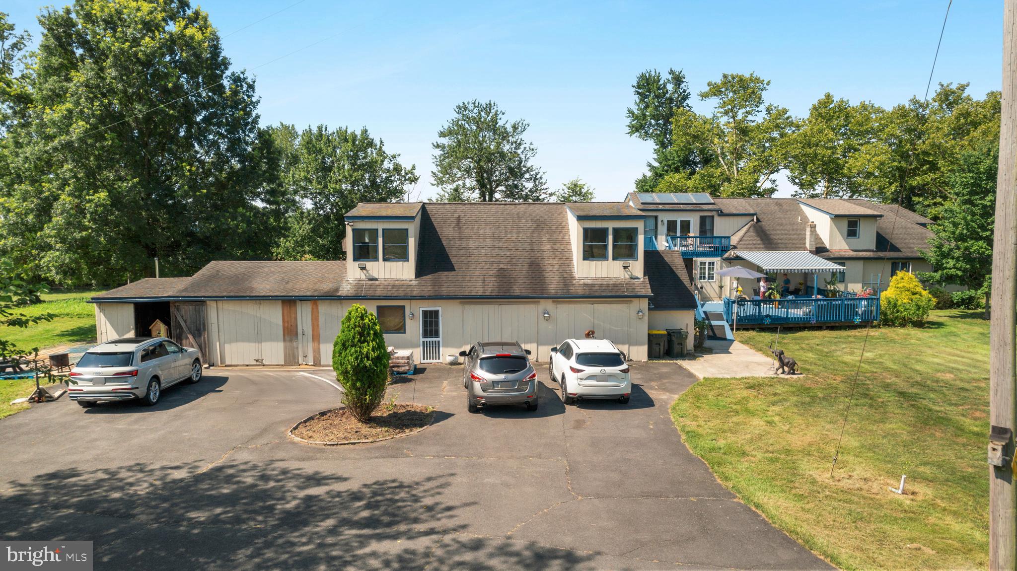 415 Geigel Hill Road Upper Black Eddy, PA 18972 - Photo 12 of 51 a front view of a house with cars parked