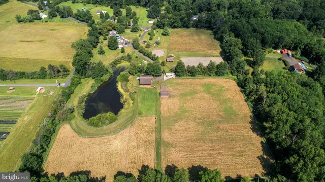 a living room filled with furniture and a window