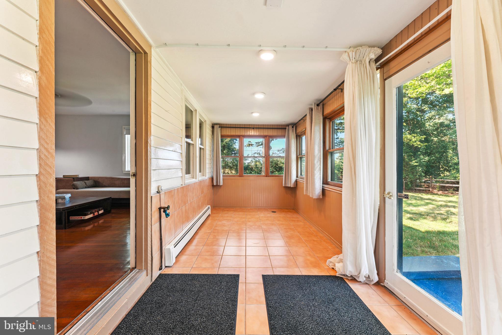 415 Geigel Hill Road Upper Black Eddy, PA 18972 - Photo 30 of 51 a view of a hallway with wooden floor and livingroom view