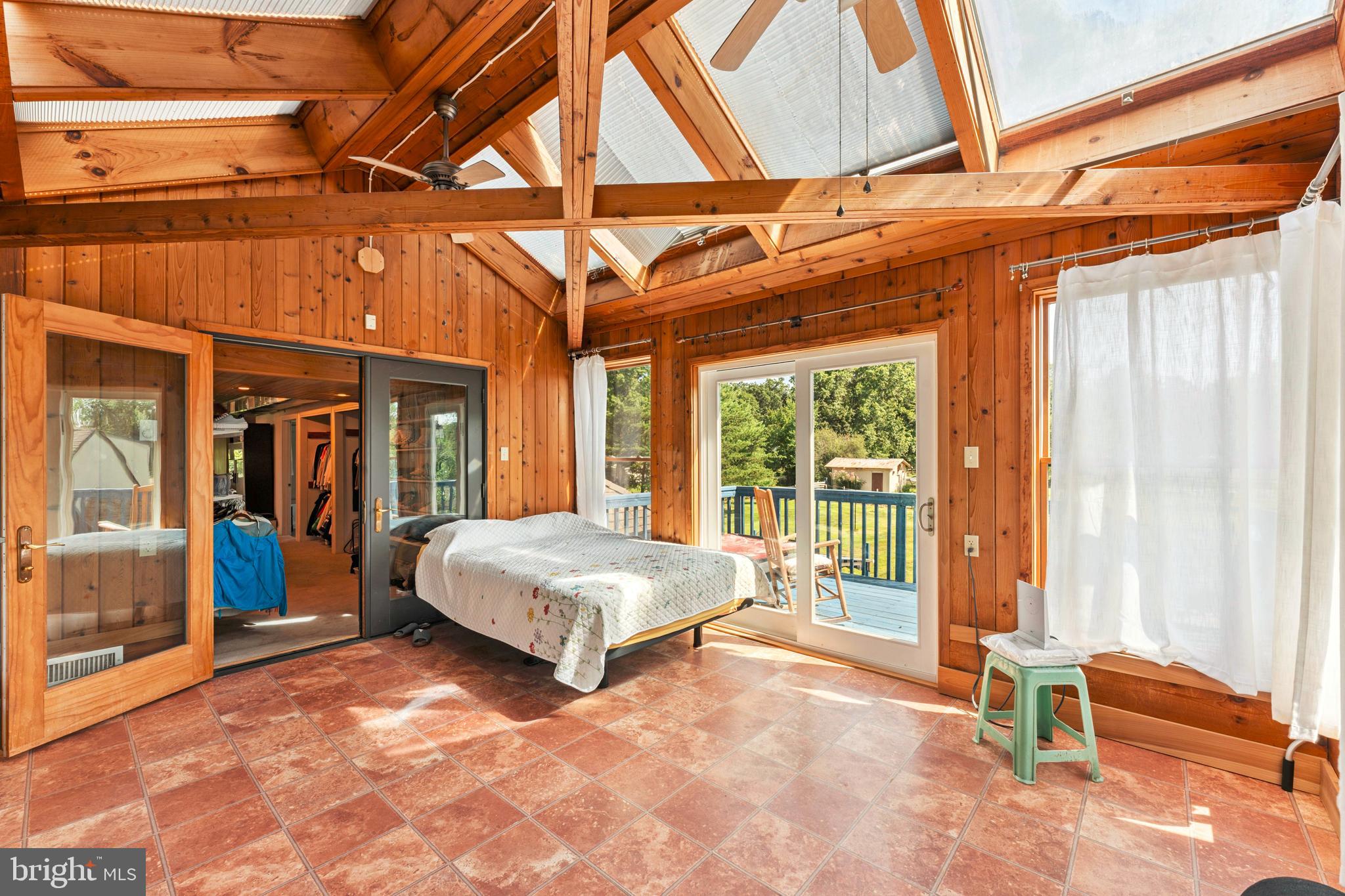 415 Geigel Hill Road Upper Black Eddy, PA 18972 - Photo 39 of 51 a bedroom with a bed and large window