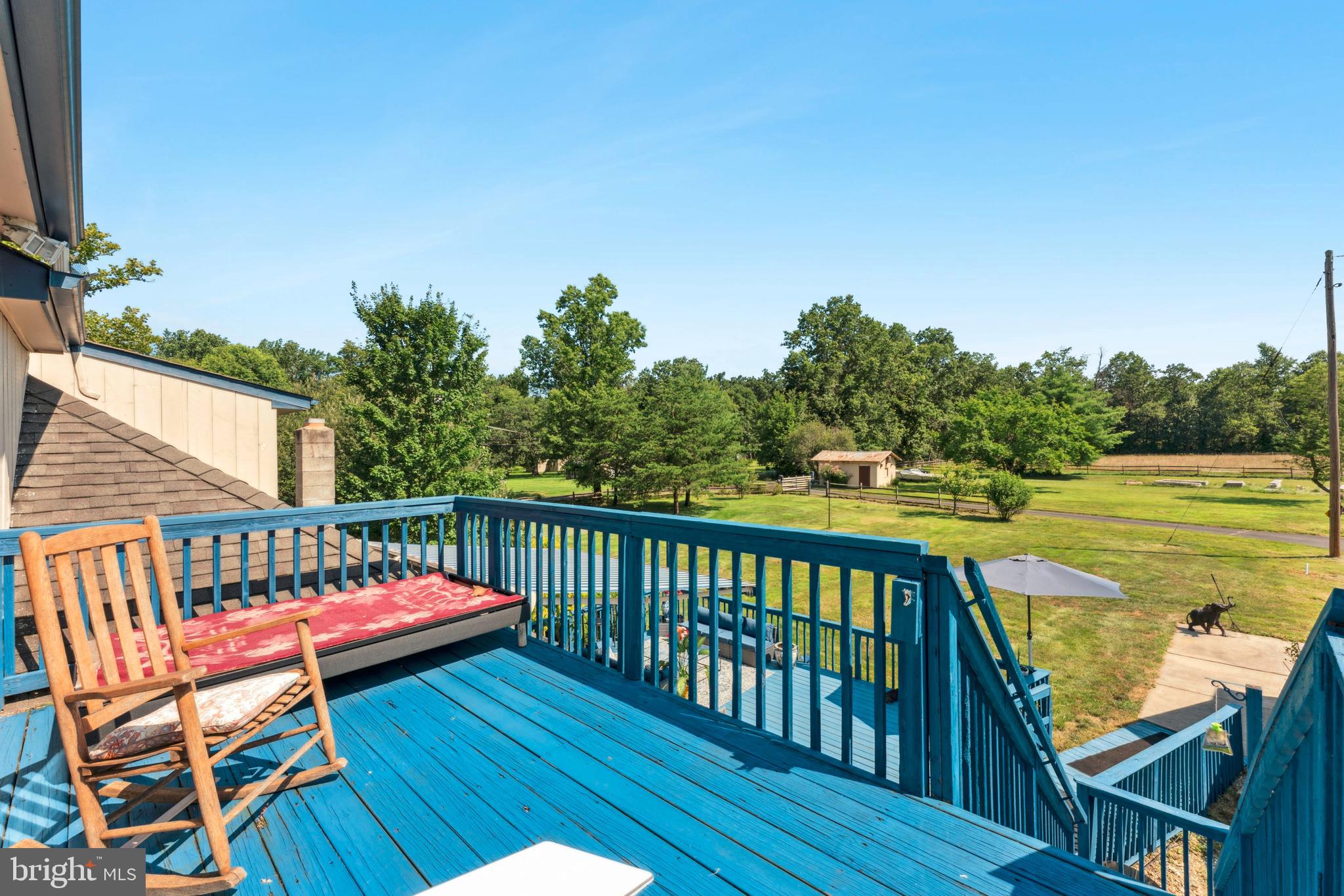 415 Geigel Hill Road Upper Black Eddy, PA 18972 - Photo 9 of 51 a view of balcony with wooden floor and seating space
