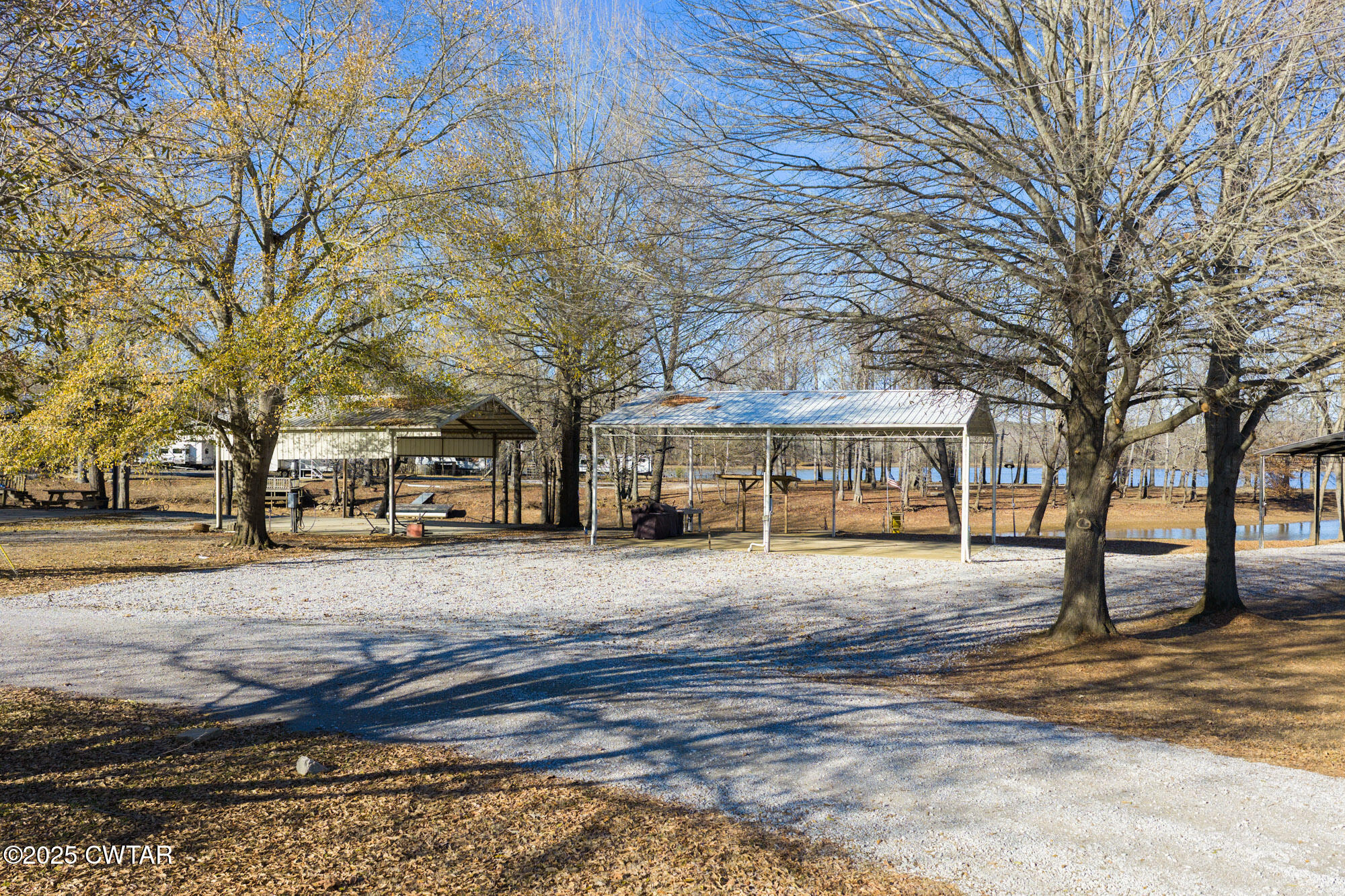 0 Willow Oaks Drive Decaturville, TN 38329 - Photo 3 of 25 a view of a house with a yard covered in snow