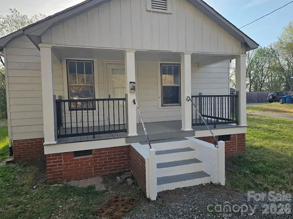 a view of a deck with a yard