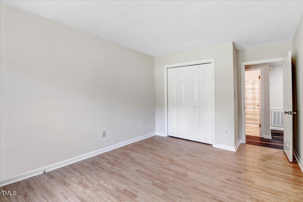 216 Bracken Court Raleigh, NC 27615 - Photo 17 of 27 1st Floor Bedroom