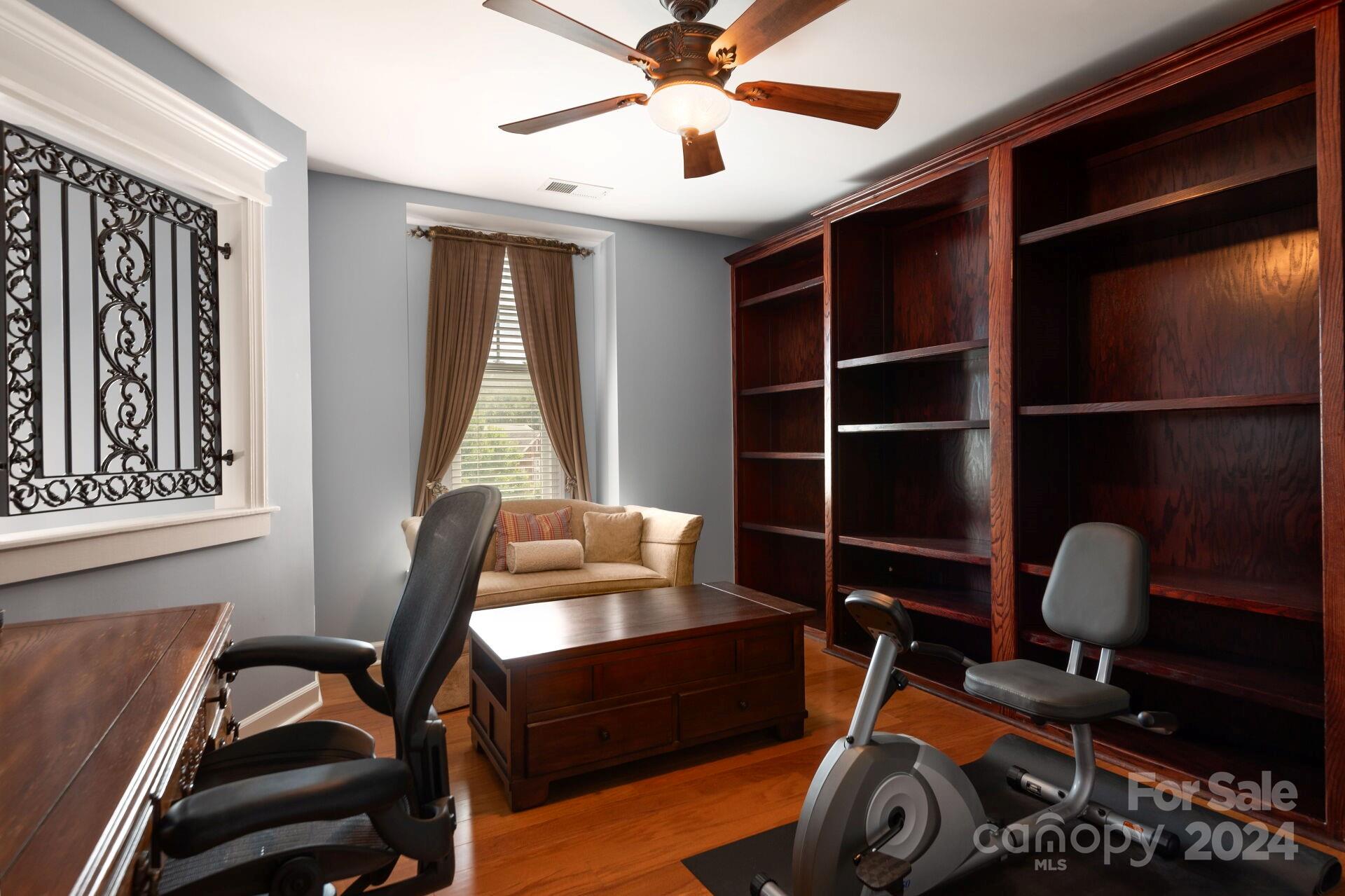 3322 Stettler View Road Charlotte, NC 28210 - Photo 17 of 27 a view of a workspace with furniture and a window