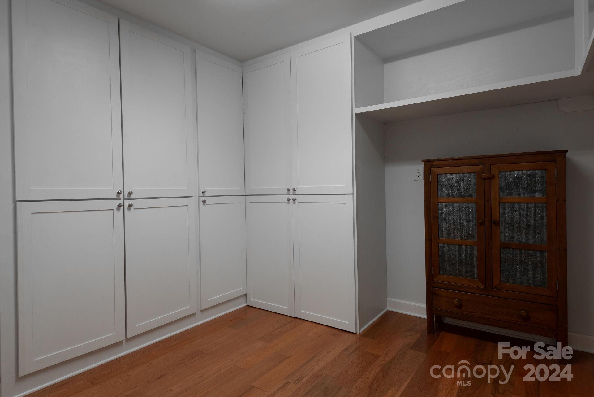 3322 Stettler View Road Charlotte, NC 28210 - Photo 20 of 27 an empty room with wooden floor