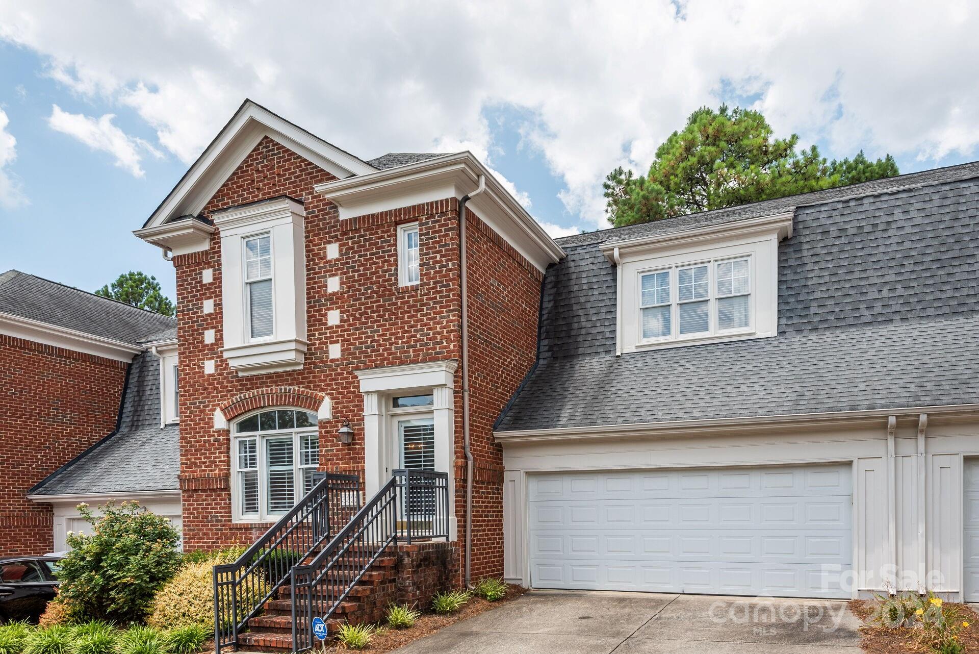 3322 Stettler View Road Charlotte, NC 28210 - Photo 2 of 27 a front view of a house with a yard