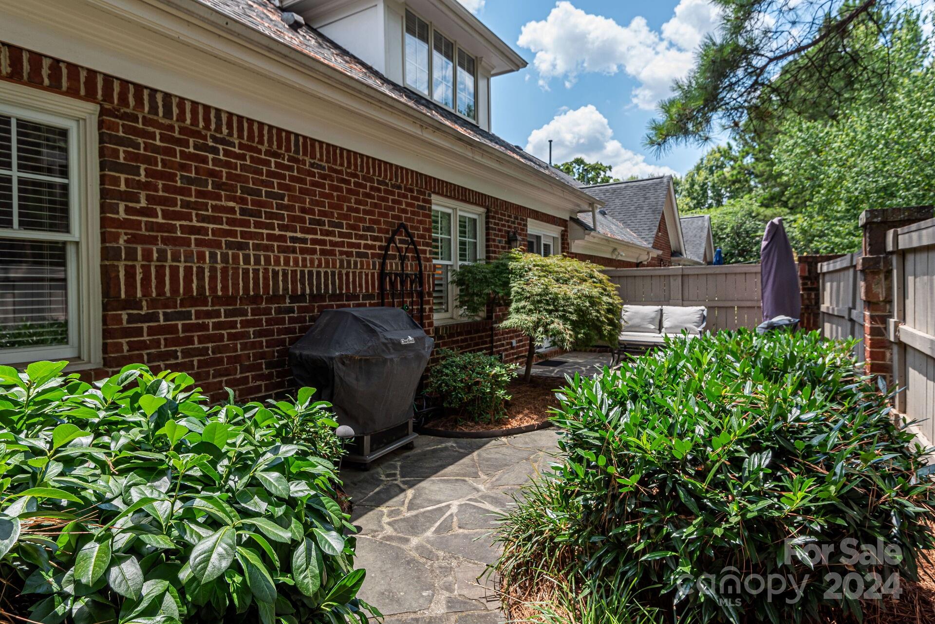 3322 Stettler View Road Charlotte, NC 28210 - Photo 27 of 27 a front view of a house with garden