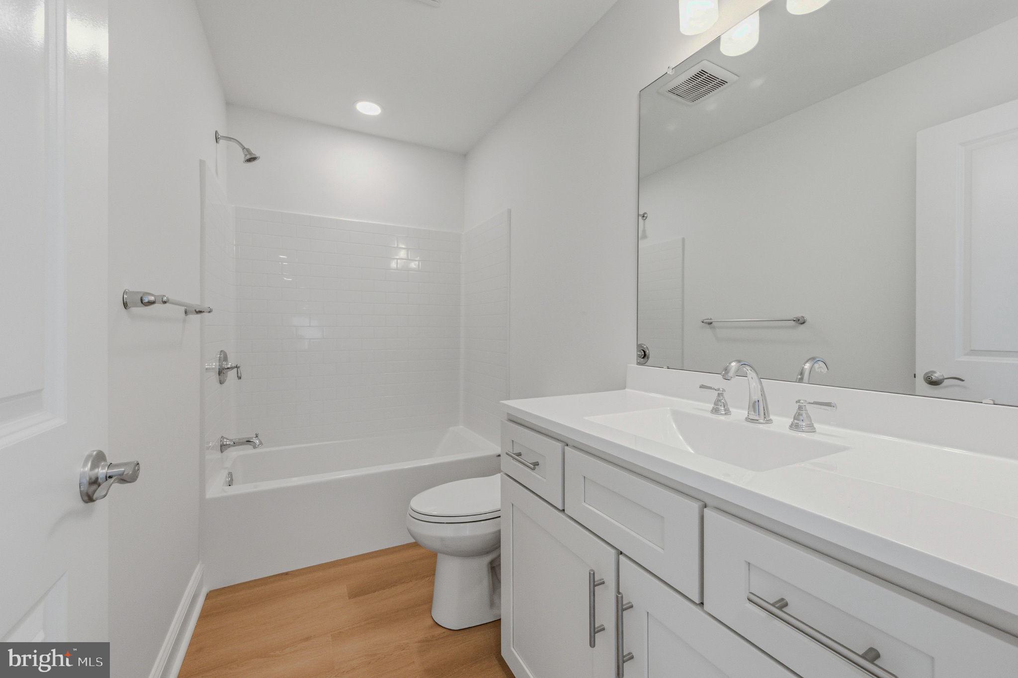 2503 A Duncan Road Wilmington, DE 19808 - Photo 24 of 41 a bathroom with a sink a toilet and shower