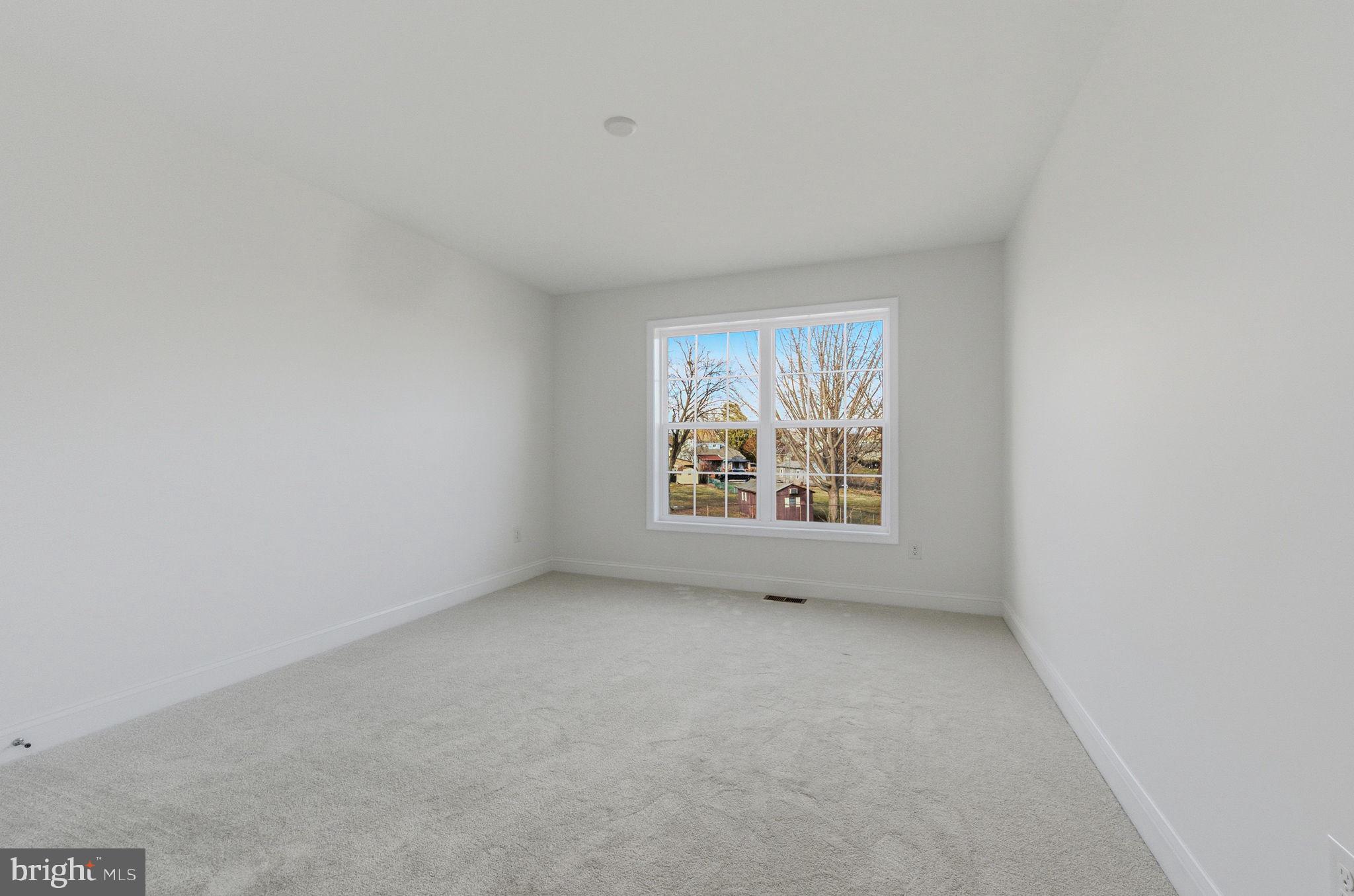 2503 A Duncan Road Wilmington, DE 19808 - Photo 29 of 41 an empty room with windows