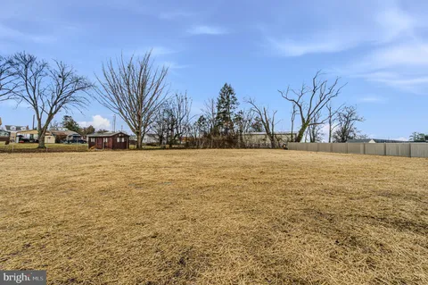 a view of swimming pool with an ocean view