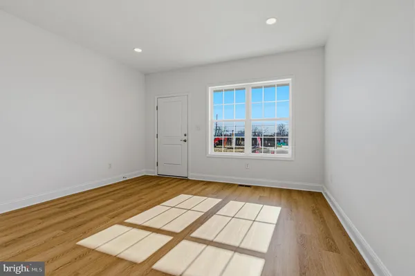 a view of an empty room and window