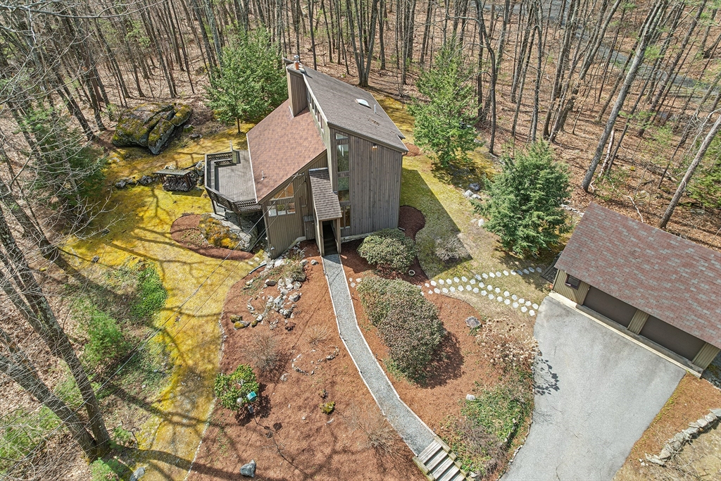 222 Davidson Road Boxborough, MA 01719 - Photo 1 of 16 front view of a house with a yard