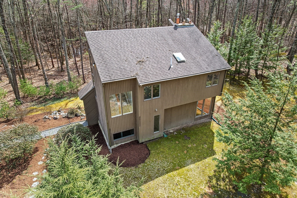 222 Davidson Road Boxborough, MA 01719 - Photo 11 of 16 a house with tall trees