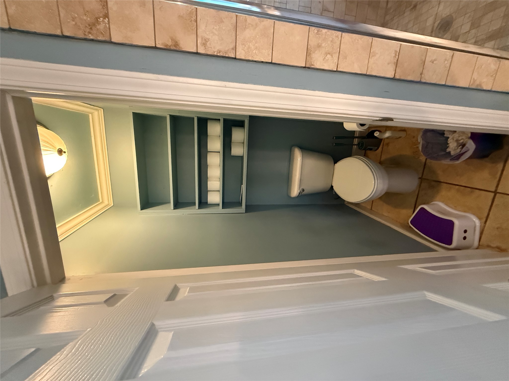 7501 West Gate Boulevard Austin, TX 78745 - Photo 14 of 33 Bathroom with light tile patterned floors and crown molding