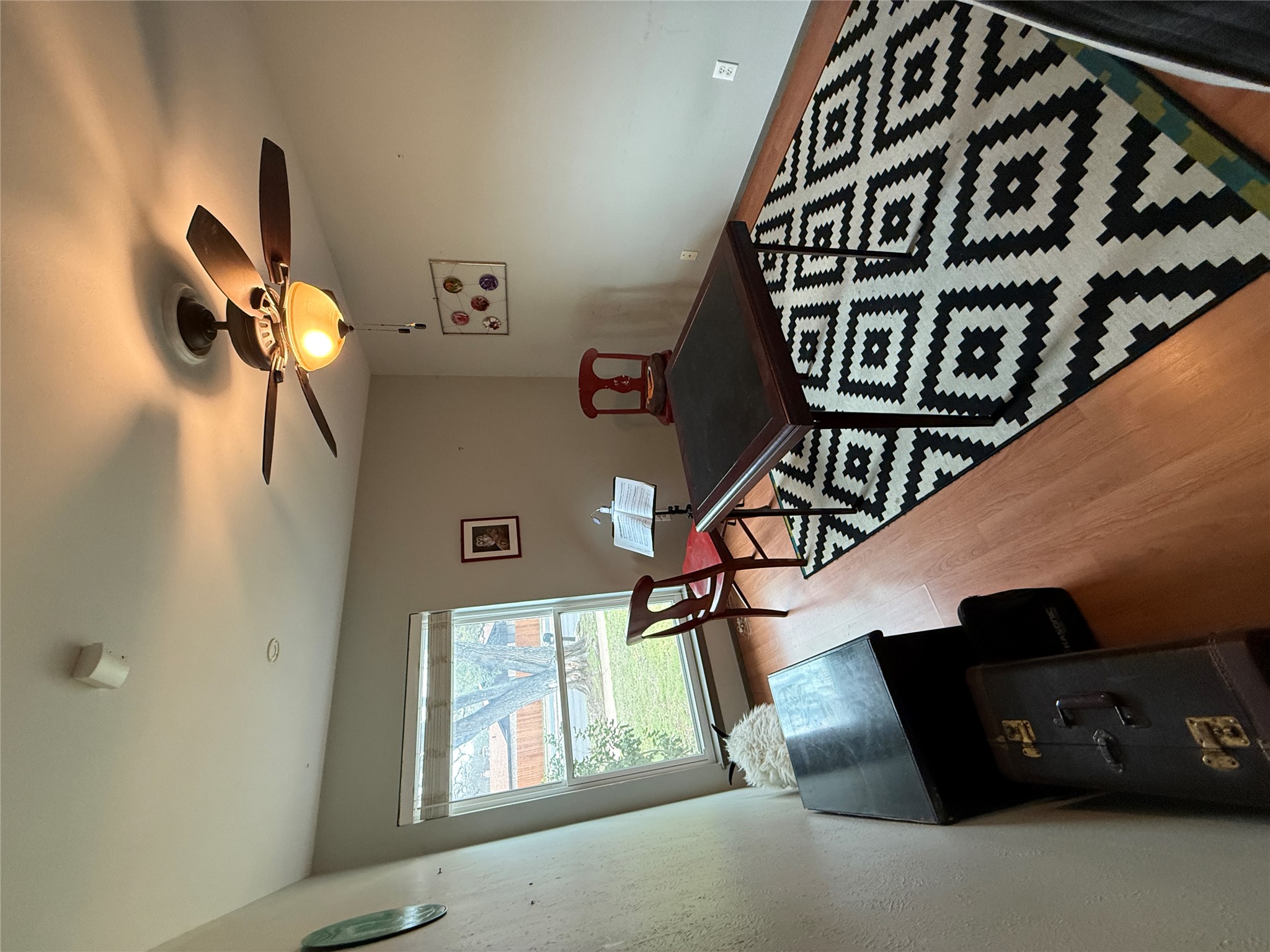 7501 West Gate Boulevard Austin, TX 78745 - Photo 19 of 33 Dining space featuring light wood-type flooring and a ceiling fan