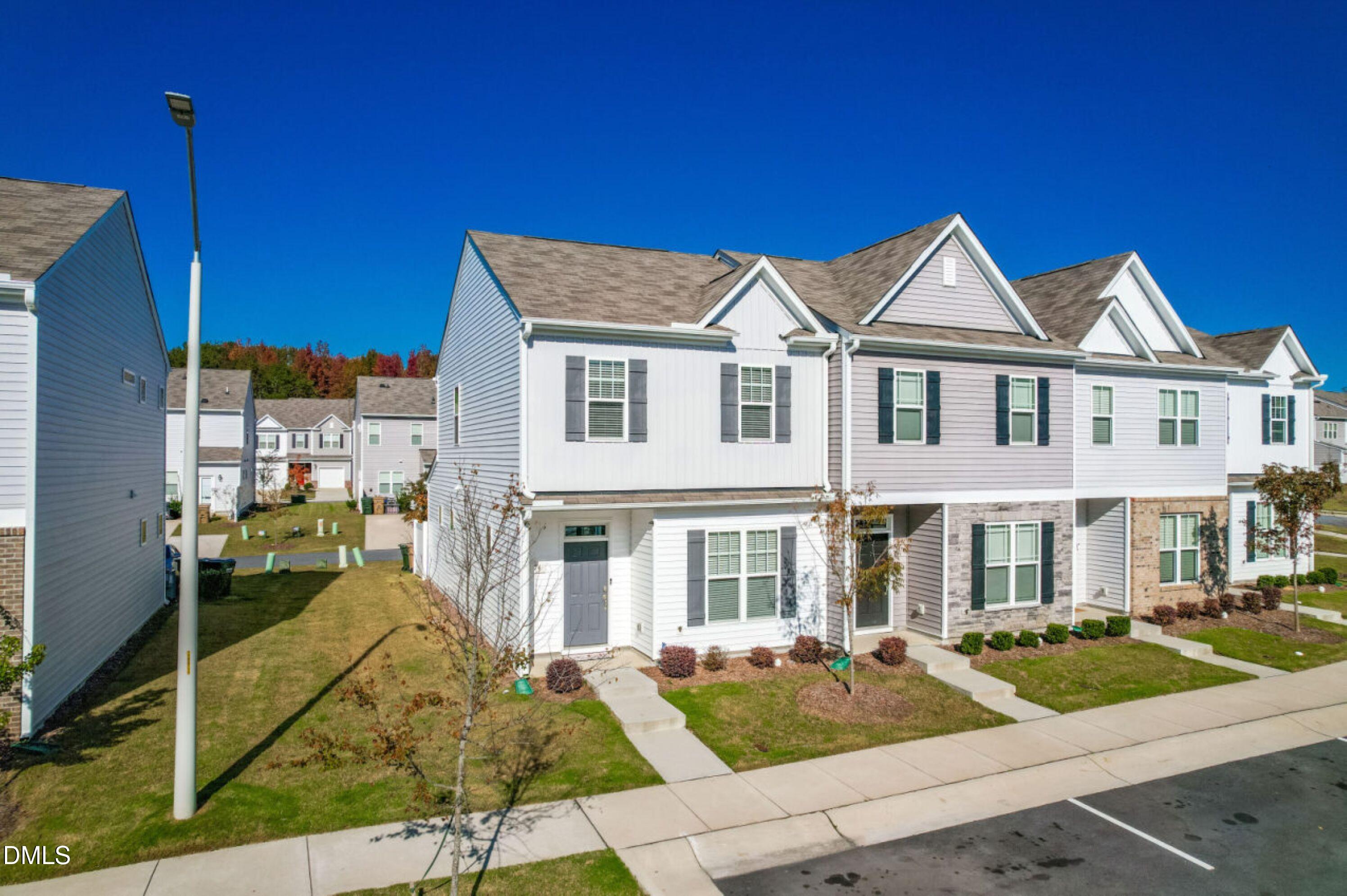 74 Liam Street Clayton, NC 27520 - Photo 2 of 33 front view of a house with a patio