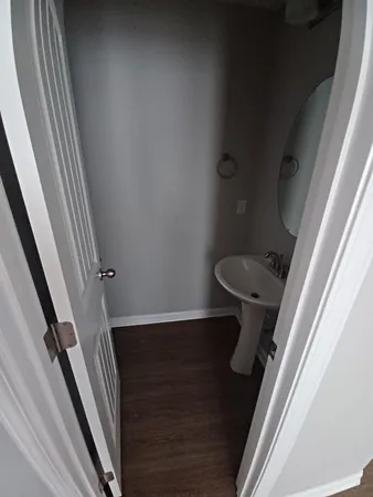 a bathroom with a sink and toilet