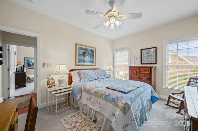 a bedroom with a bed furniture and a window