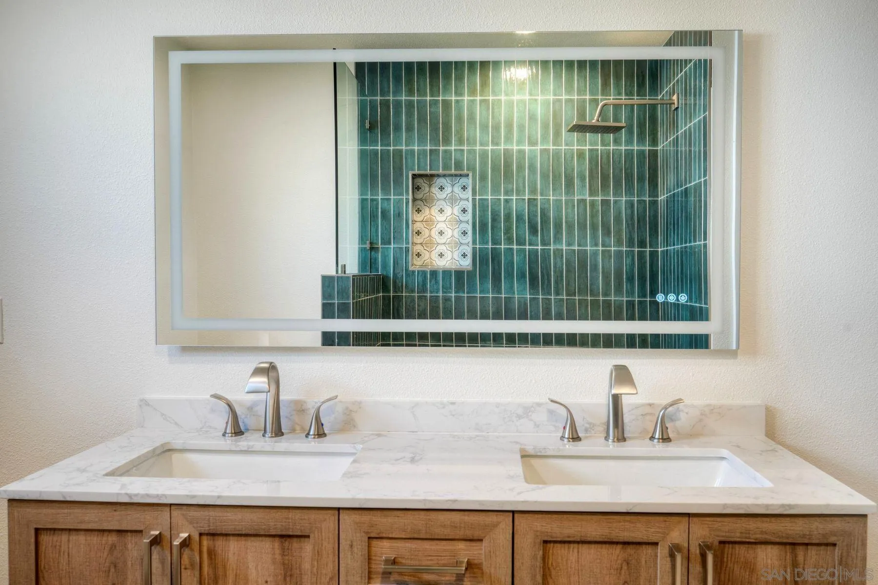 578 East Indian Rock Road Vista, CA 92084 - Photo 11 of 30 a bathroom with a sink a vanity and a mirror