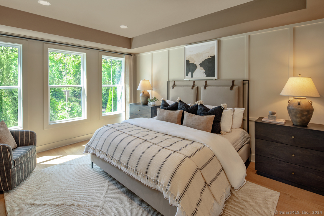 14 Whisper Rdg Way, Unit 46 Woodbridge, CT 06525 - Photo 5 of 14 a bedroom with a bed and a couch