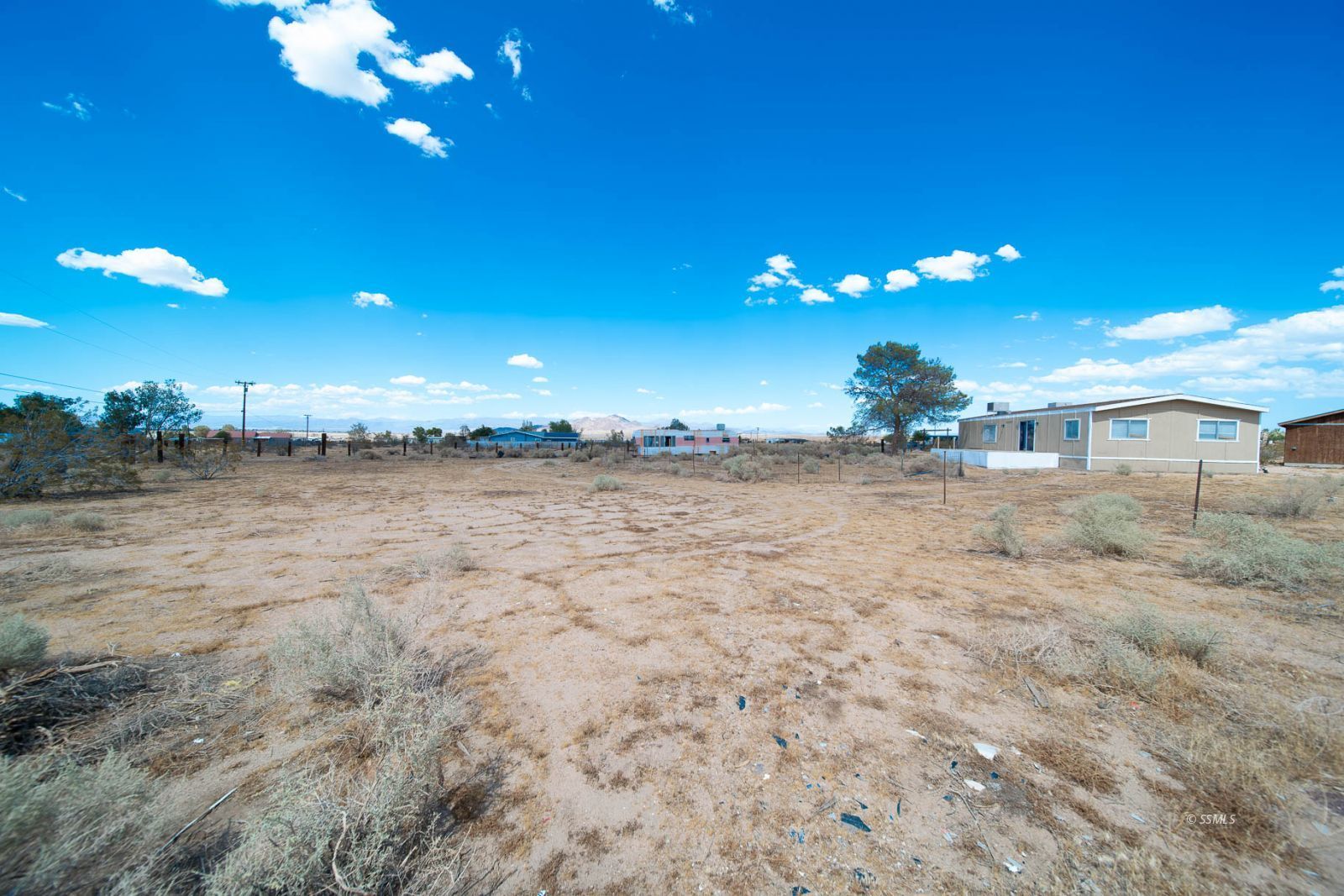 817 South Lamb Road Ridgecrest, CA 93555 - Photo 33 of 39 a view of a house with a street