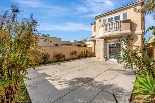 a view of a building with a yard