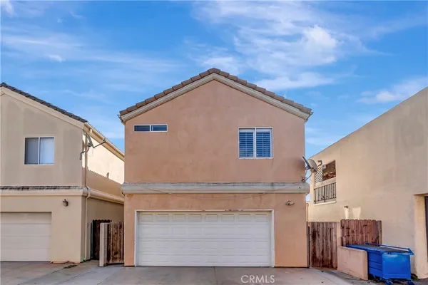 a view of a house with a garage