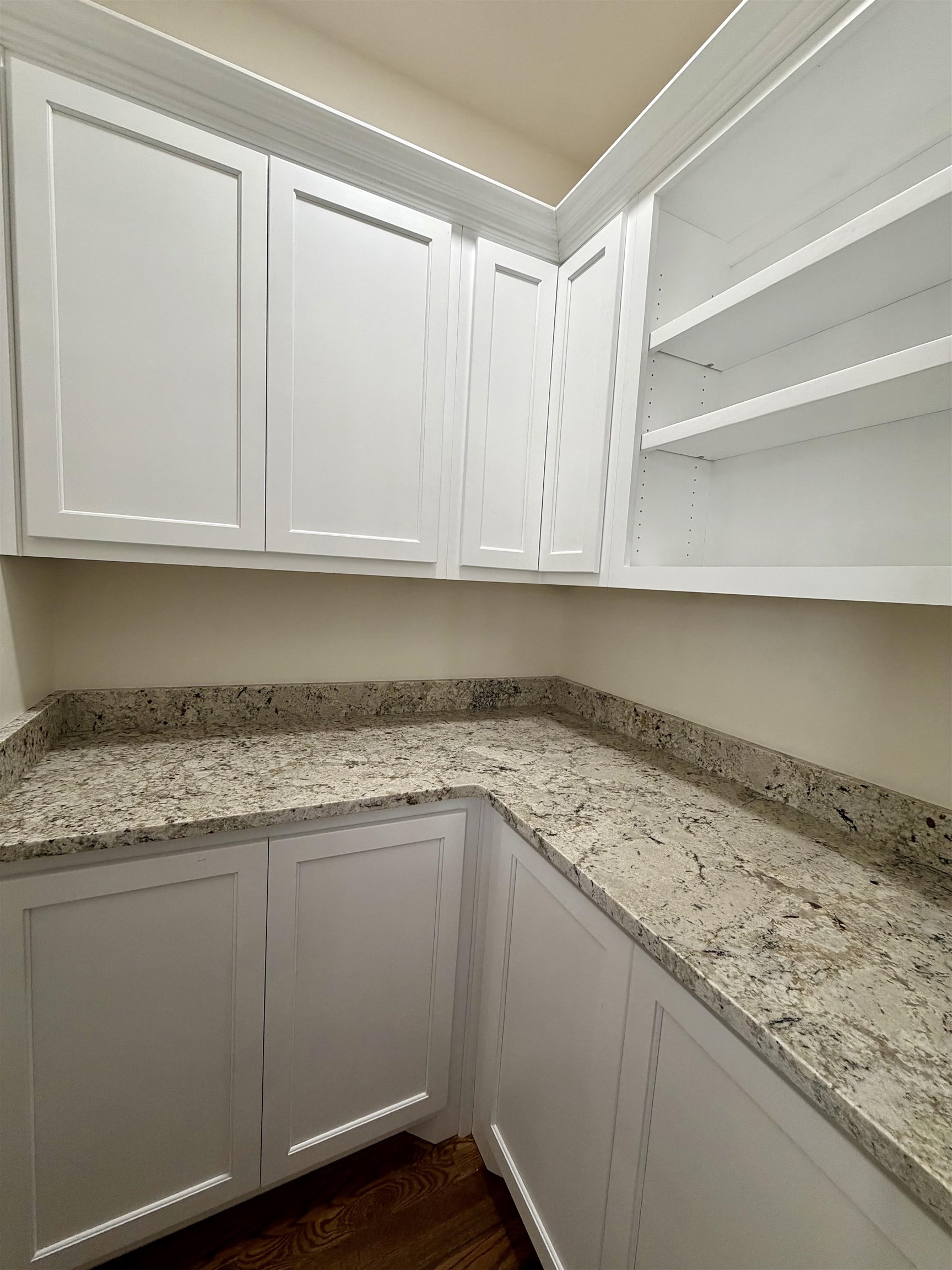 172 New Bethel Road Selmer, TN 38375 - Photo 15 of 30 a kitchen with granite countertop cabinets and window
