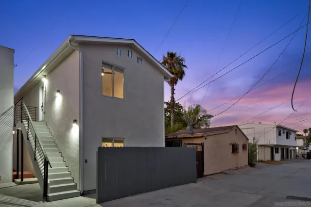 a view of a house with a garage