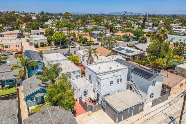 an aerial view of a house with a garden