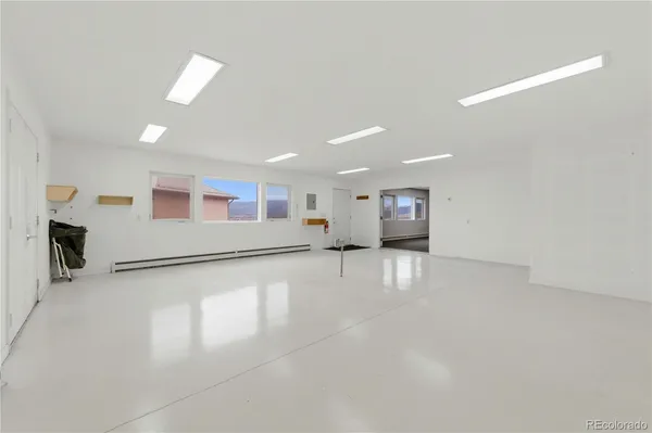 a view of a livingroom with furniture
