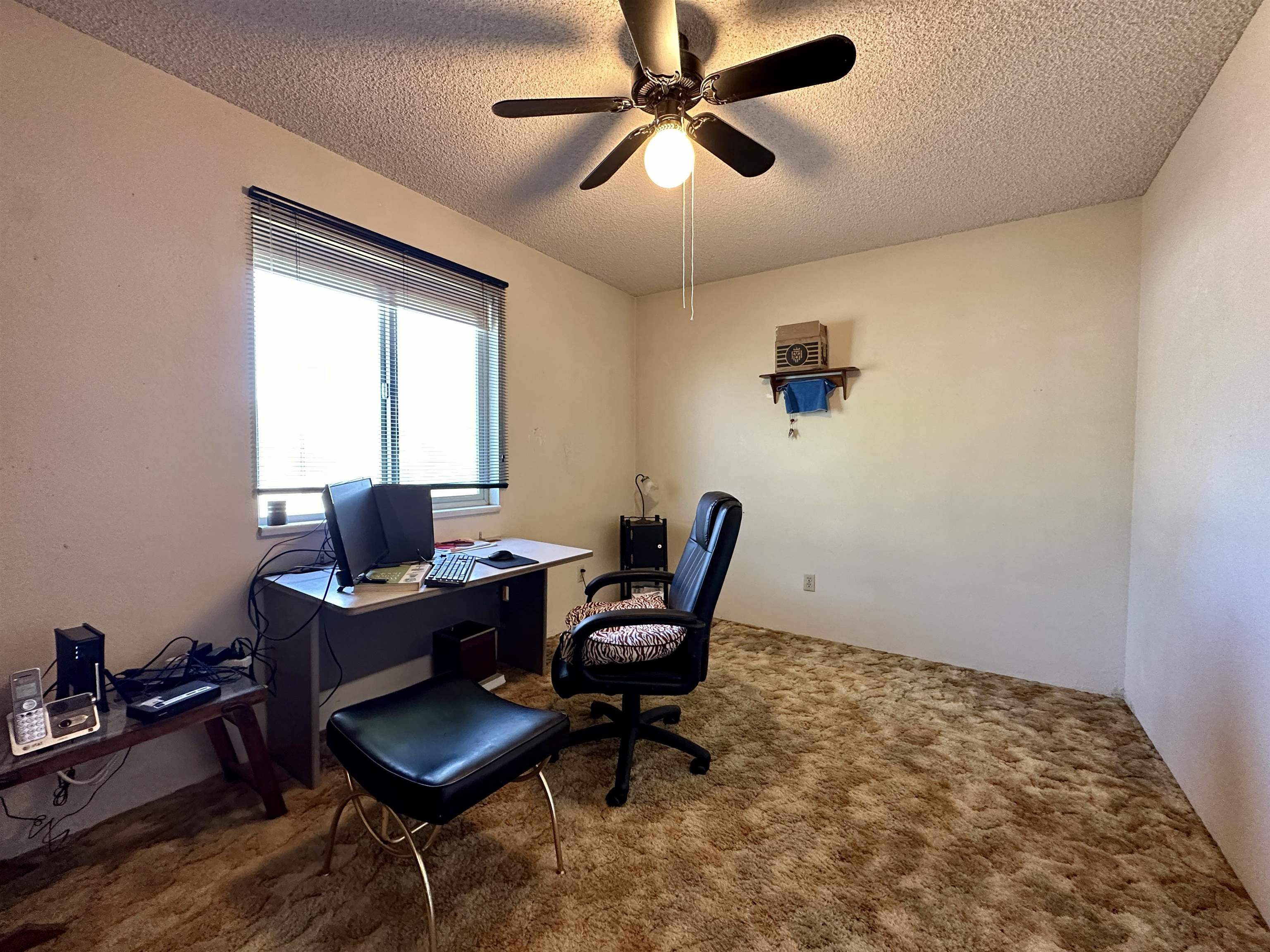 3010 F F 3/4 Road Grand Junction, CO 81504 - Photo 14 of 25 a workspace with furniture and a window