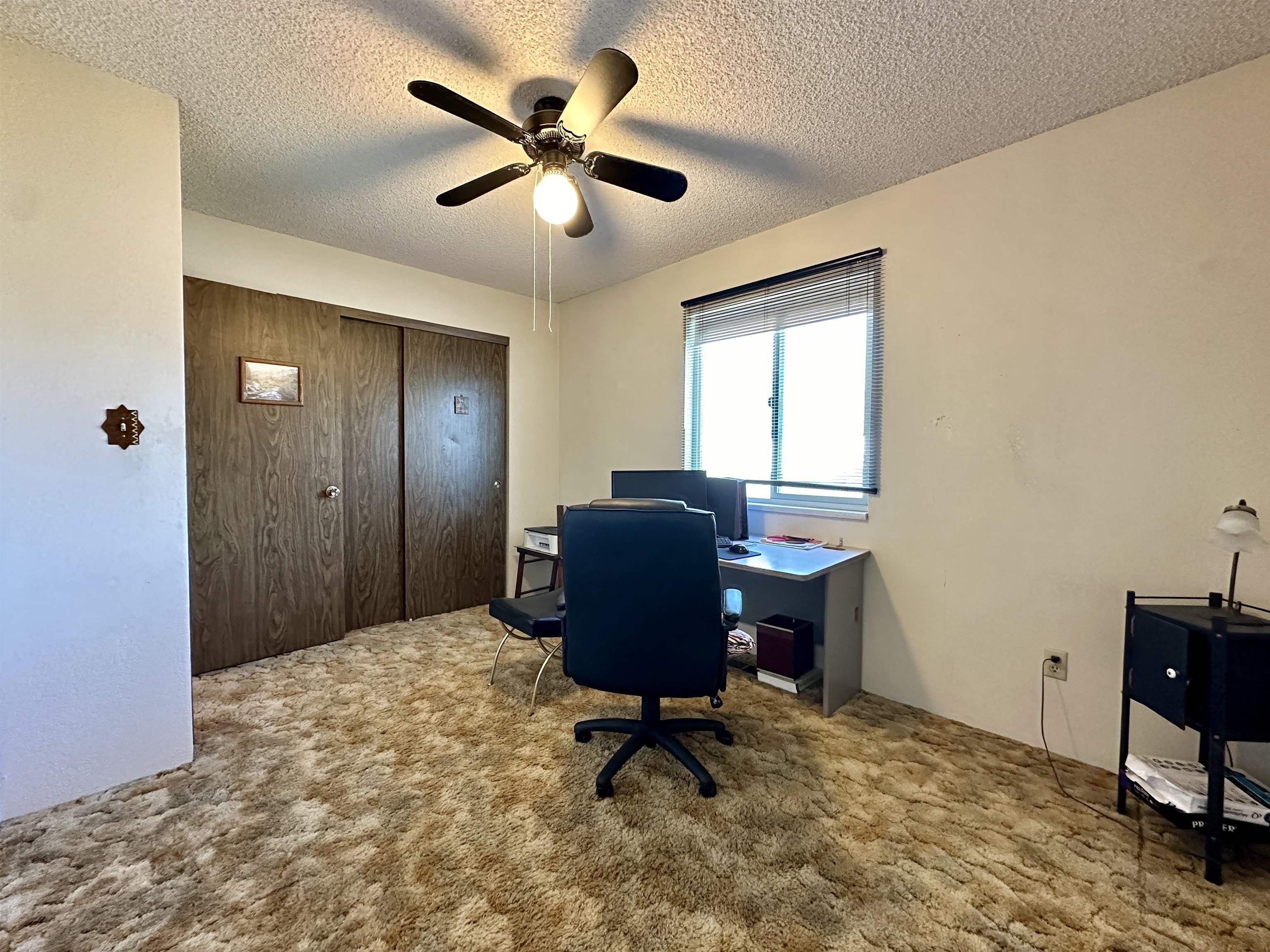3010 F F 3/4 Road Grand Junction, CO 81504 - Photo 15 of 25 a workspace with furniture and a window