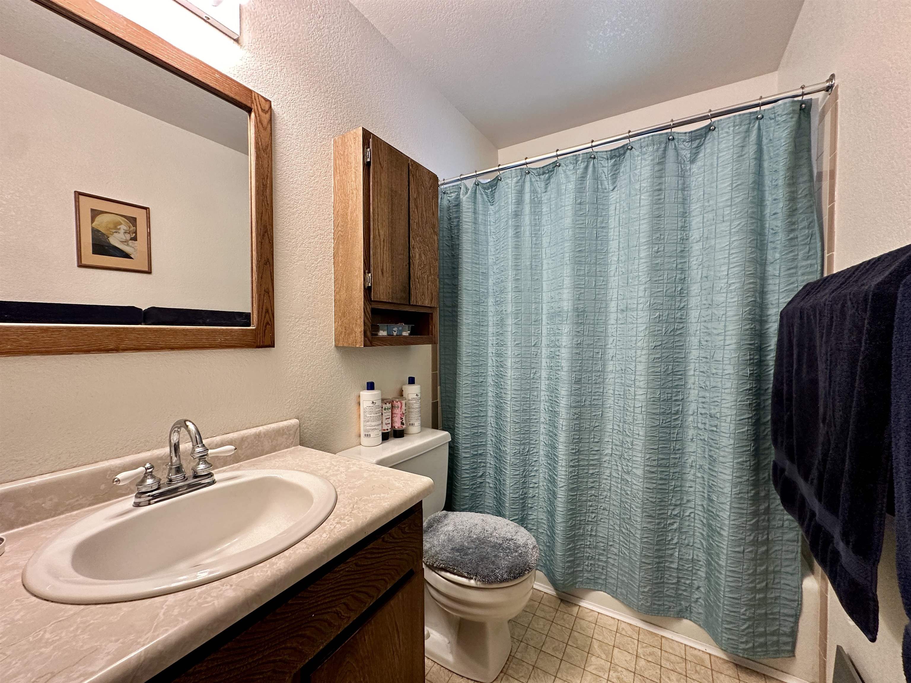 3010 F F 3/4 Road Grand Junction, CO 81504 - Photo 16 of 25 a bathroom with a sink toilet and mirror