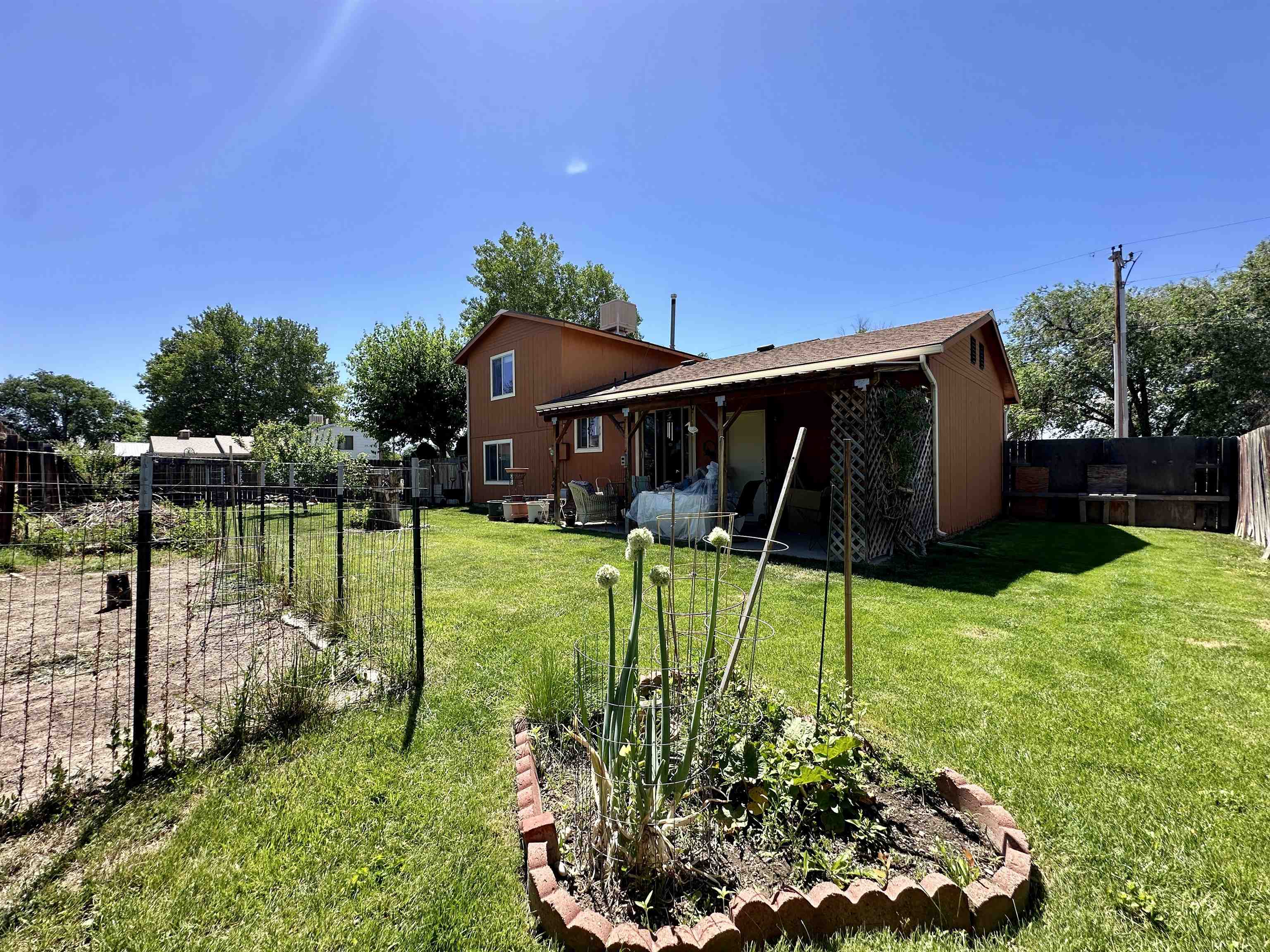 3010 F F 3/4 Road Grand Junction, CO 81504 - Photo 23 of 25 a view of a house with backyard