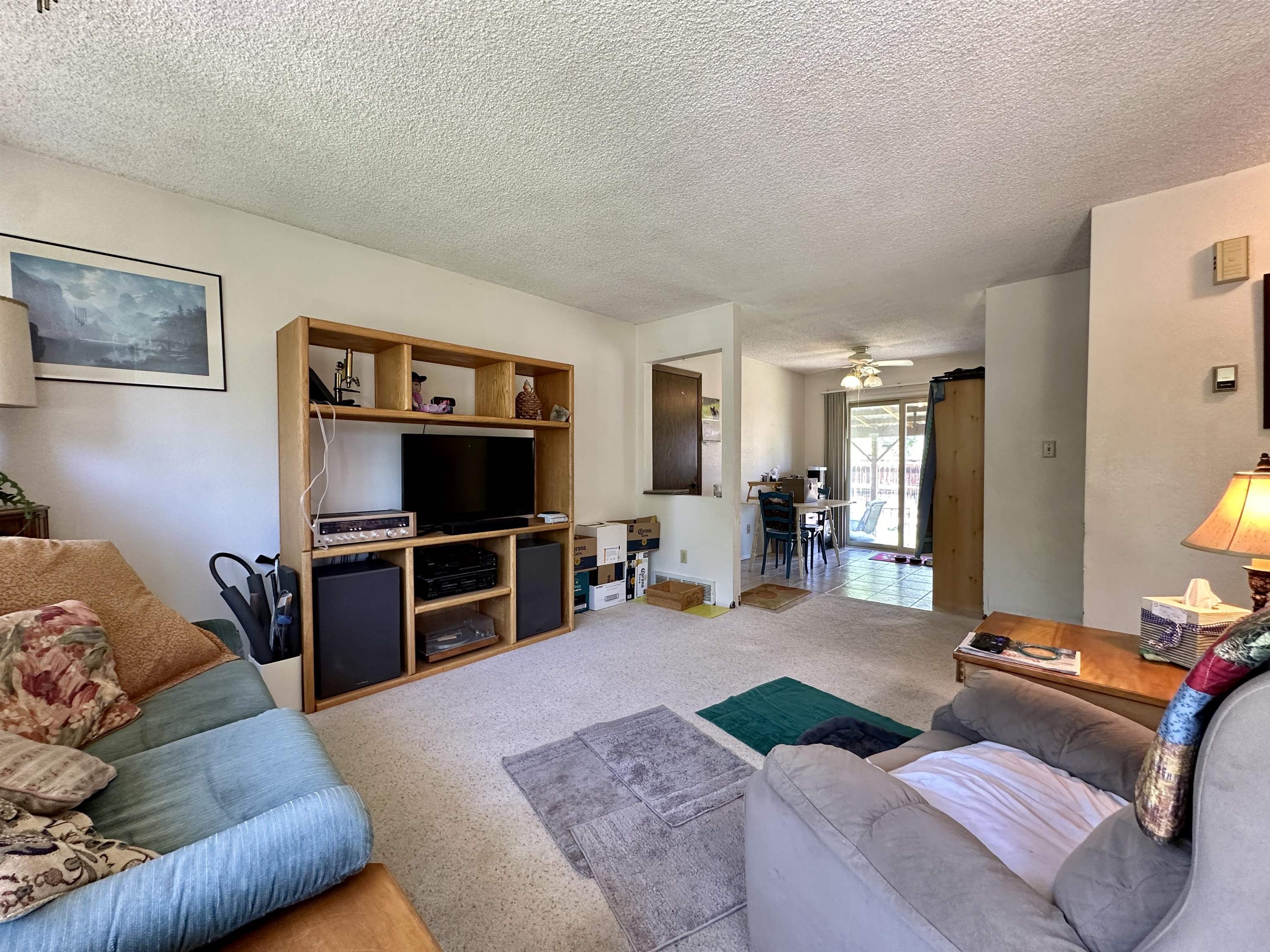 3010 F F 3/4 Road Grand Junction, CO 81504 - Photo 3 of 25 a living room with furniture and a flat screen tv