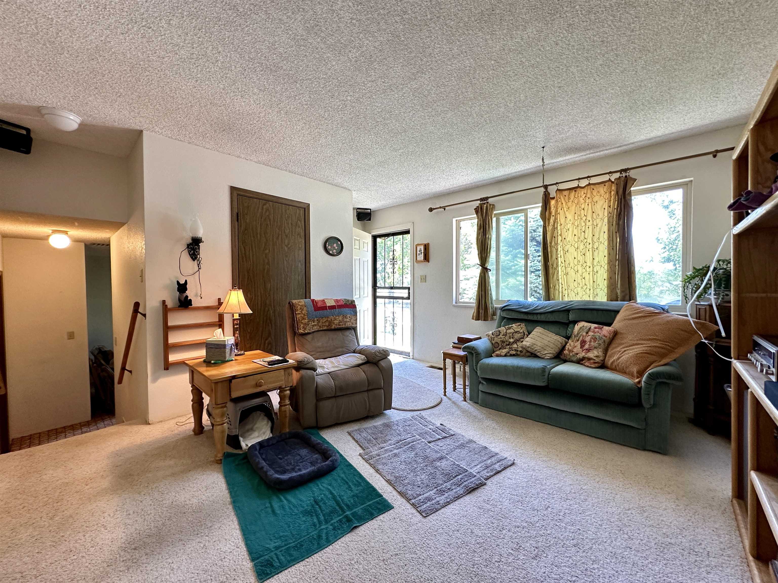 3010 F F 3/4 Road Grand Junction, CO 81504 - Photo 4 of 25 a living room with furniture and a flat screen tv