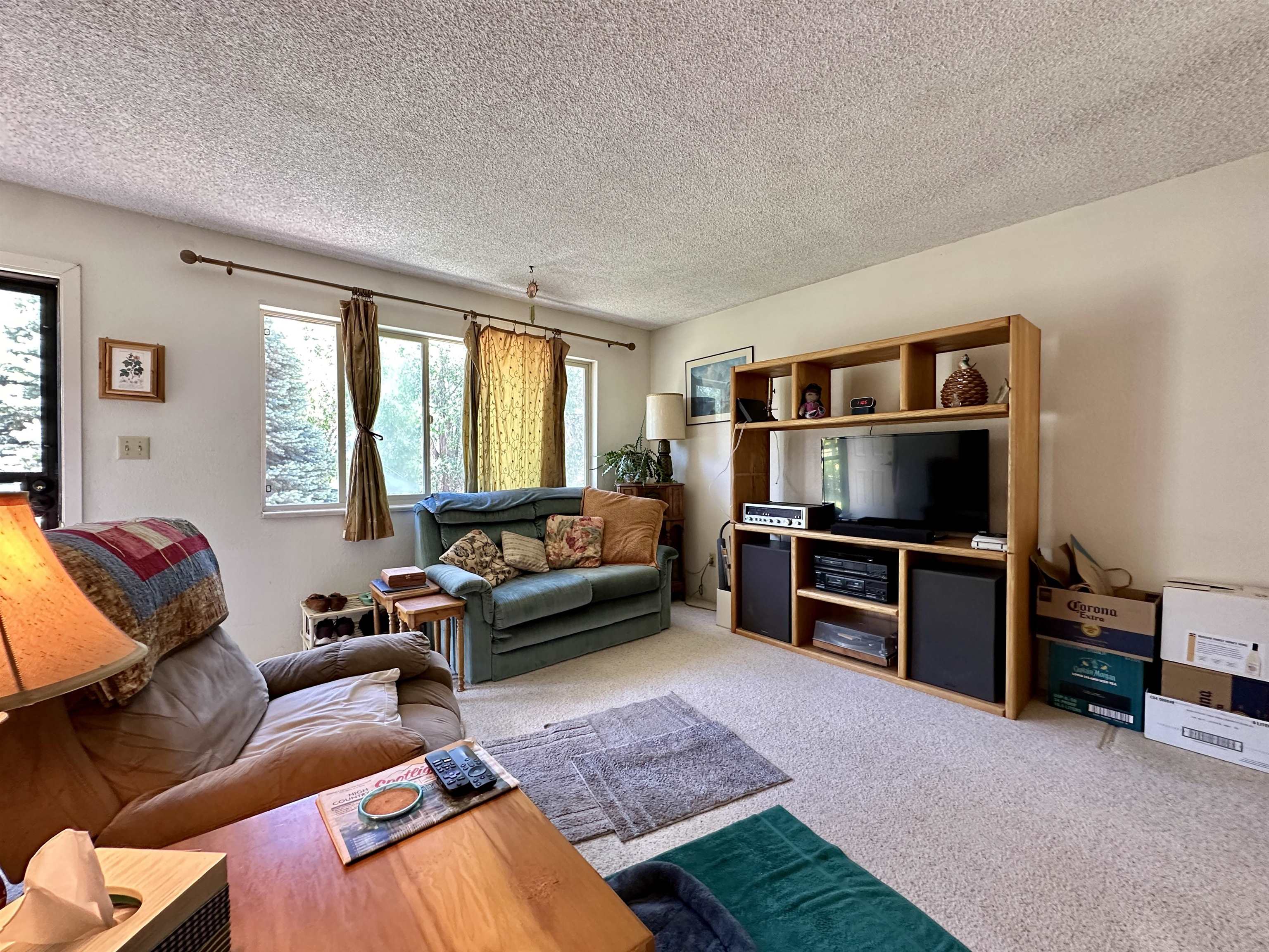 3010 F F 3/4 Road Grand Junction, CO 81504 - Photo 5 of 25 a living room with furniture and a flat screen tv