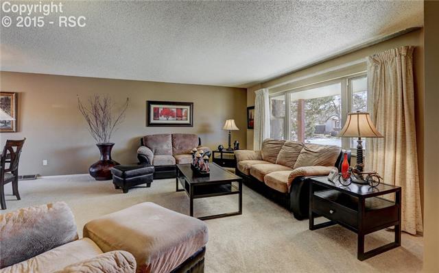 1426 York Road Colorado Springs, CO 80918 - Photo 3 of 35 Bright & Sunny Main Level Living Rm