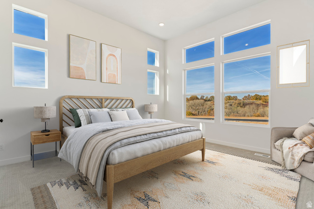 1237 East Amaryllis Way Layton, UT 84040 - Photo 11 of 16 Main Floor owners bedroom with lots of windows. Picture of another home of same floorplan