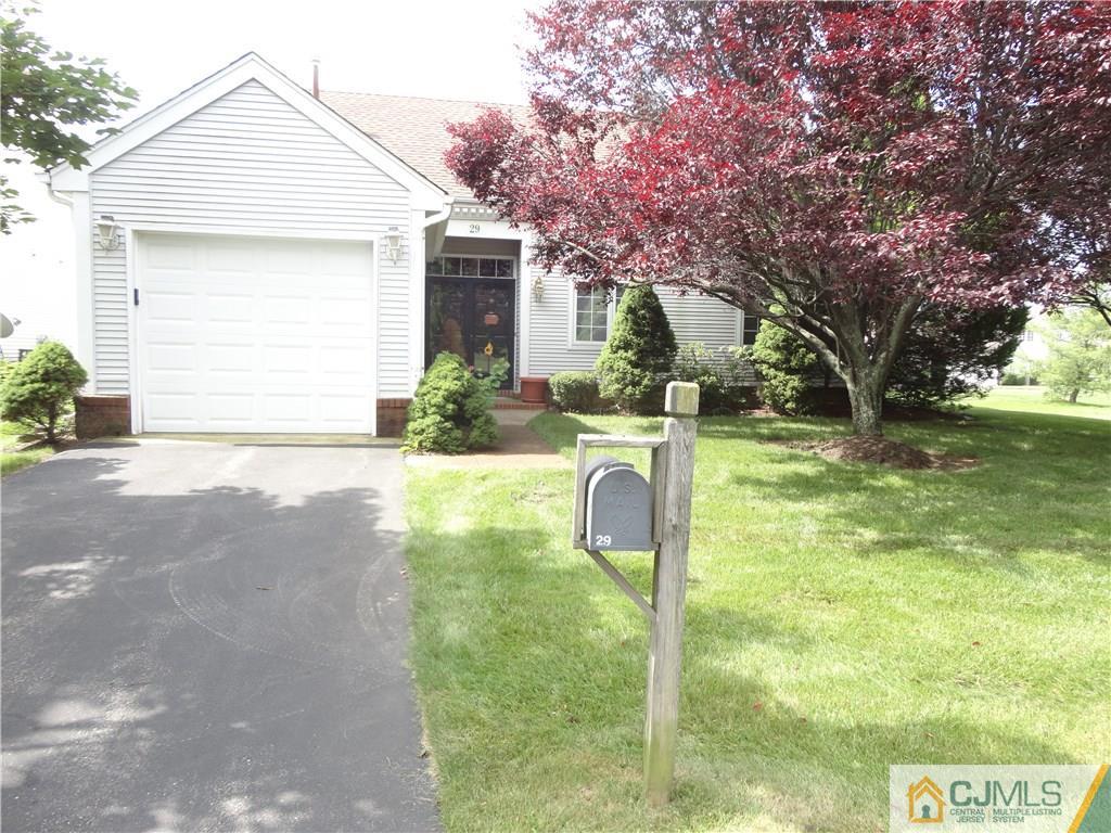 29 Winthrop Road Monroe Township, NJ 08831 - Photo 1 of 25 a view of a house with backyard and a tree