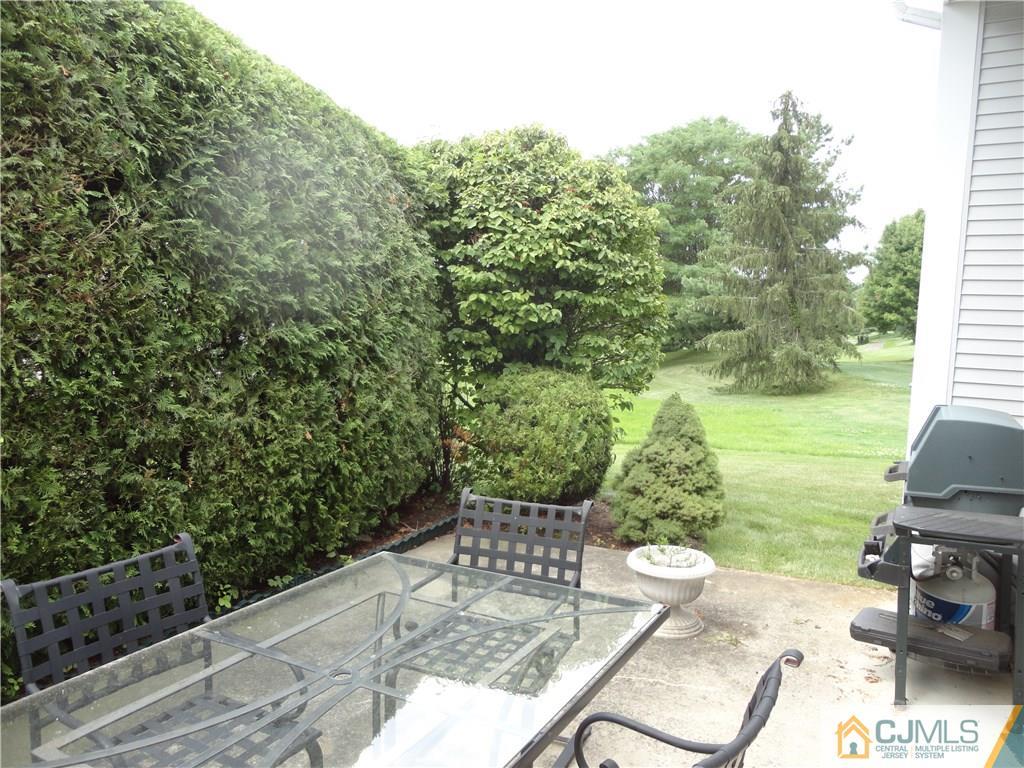 29 Winthrop Road Monroe Township, NJ 08831 - Photo 3 of 25 a view of a backyard with sitting area