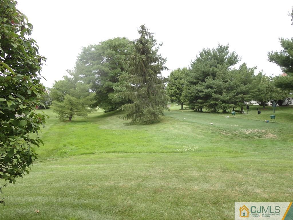 29 Winthrop Road Monroe Township, NJ 08831 - Photo 4 of 25 a view of a field with an trees