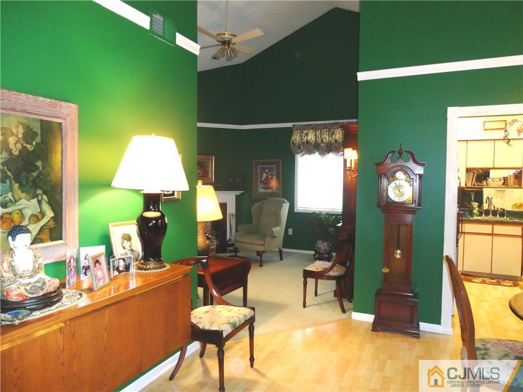 29 Winthrop Road Monroe Township, NJ 08831 - Photo 7 of 25 a living room with furniture and a large window