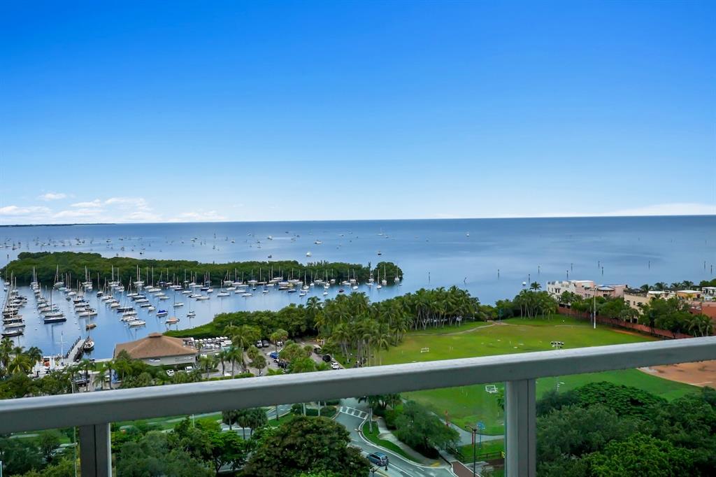 2889 McFarlane Road, Unit 1516 Miami, FL 33133 - Photo 13 of 18 a view of a city skyline from a balcony