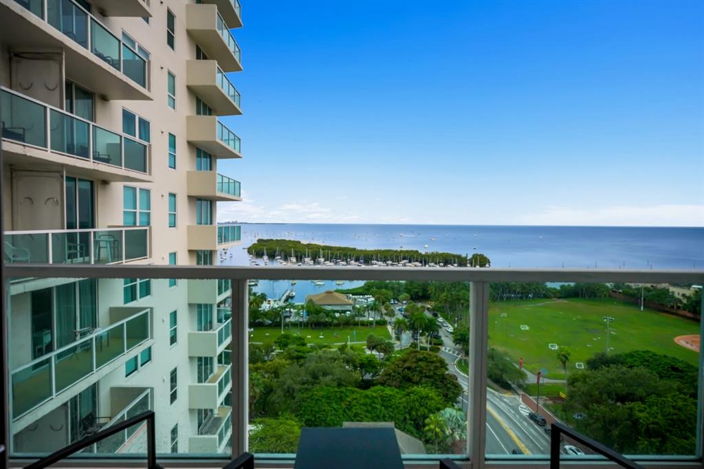 2889 McFarlane Road, Unit 1516 Miami, FL 33133 - Photo 14 of 18 a view of a balcony with an outdoor space