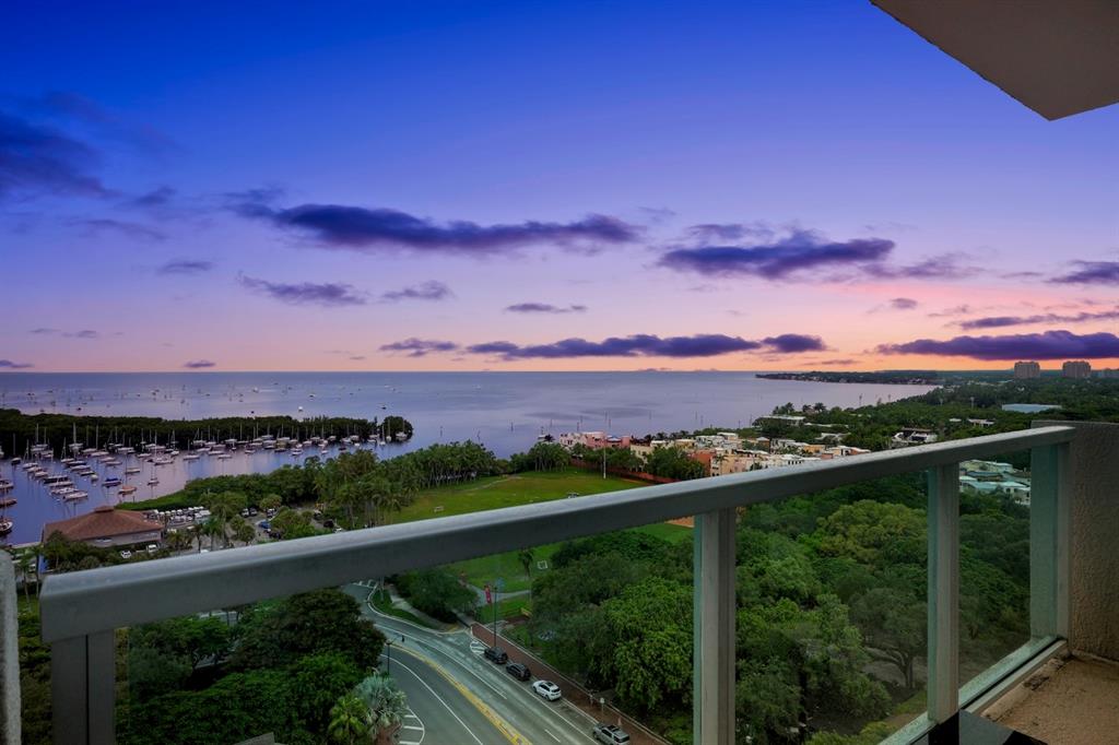 2889 McFarlane Road, Unit 1516 Miami, FL 33133 - Photo 17 of 18 a view of a city skyline from a balcony