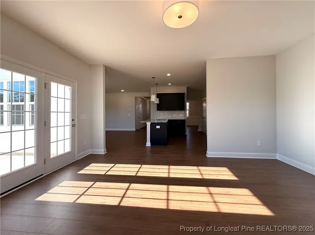 an empty room with windows